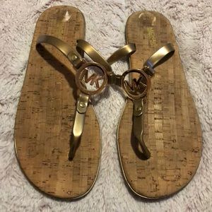 Micheal Kors Gold Flip Flops